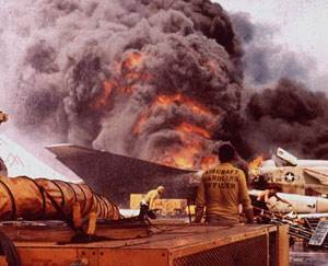 Fire erupted aboard the aircraft carrier USS Forrestal (CV 59) on July 29, 1967.